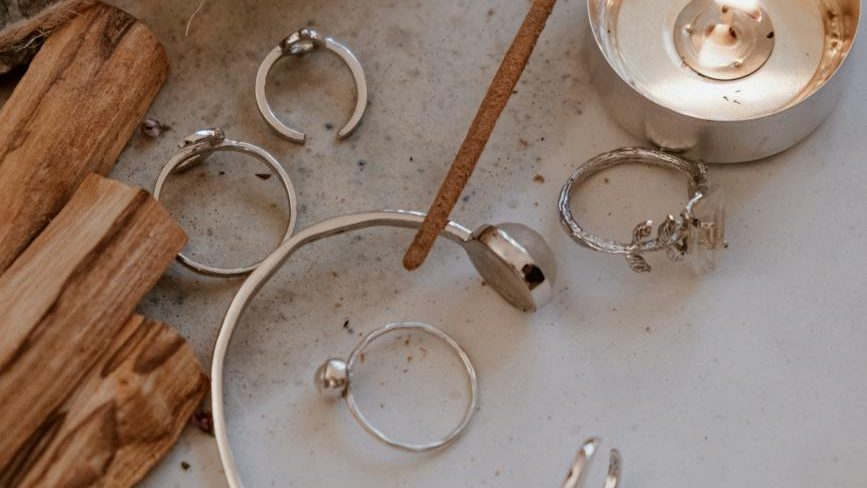 tray with trinkets and a tealight candle